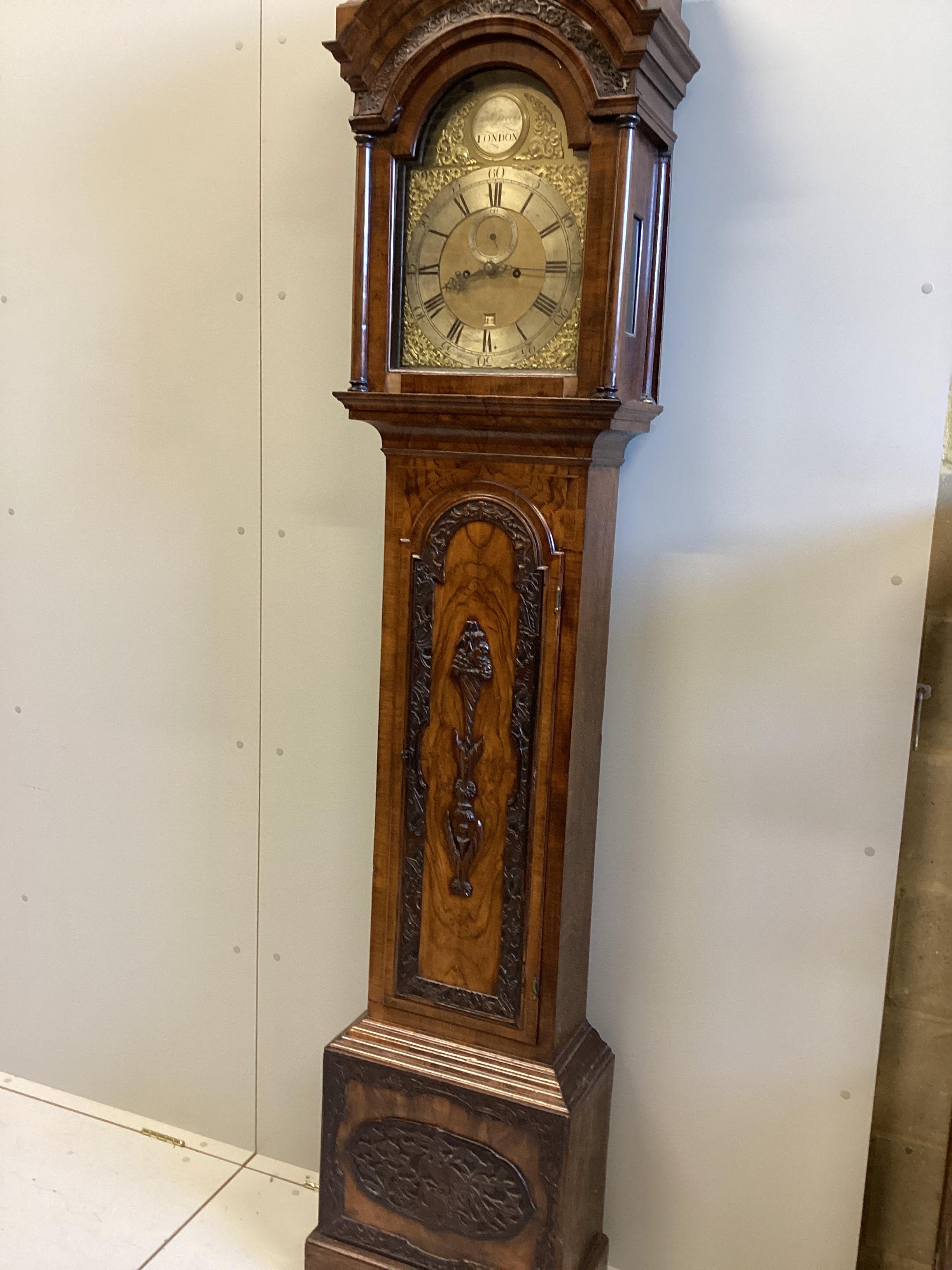 An 18th century figured walnut and oak eight day longcase clock, marked Thomas Jarvis, London, height 230cm